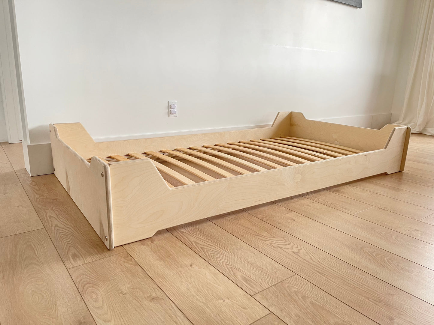 Flippable montessori floor bed for children close to floor.